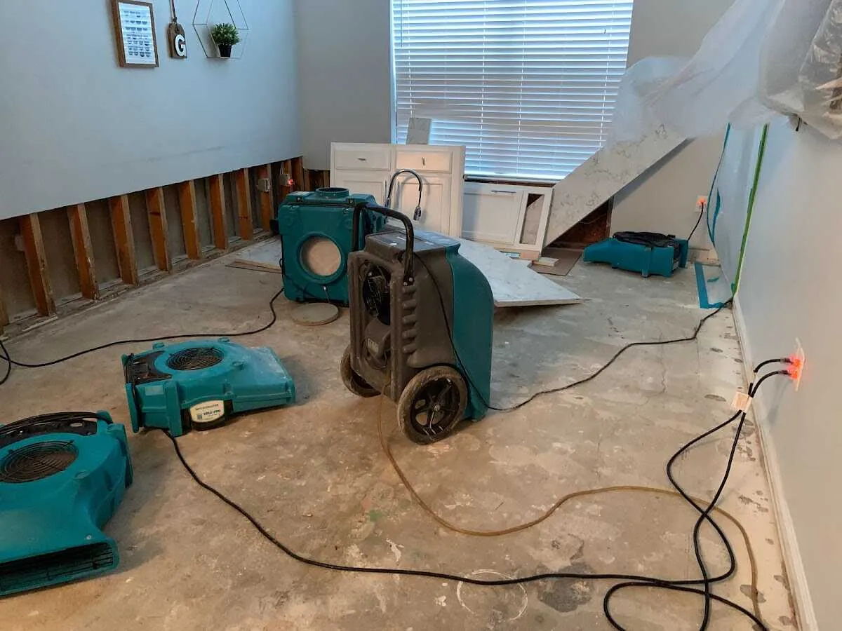 Dehumidifier in flood-cut room for Water Damage Restoration in Glenwood